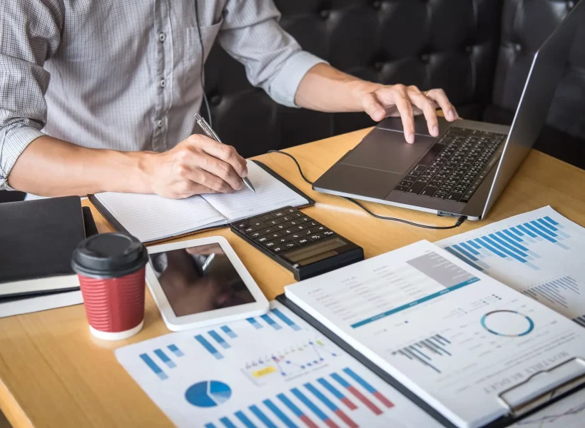 businessman-accountant-working-audit-and-calculating-expense-financial-annual-financial-report.jpg